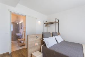 Postel nebo postele na pokoji v ubytování INSULA FELIX Bed&Breakfast
