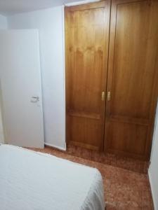 Postel nebo postele na pokoji v ubytování Casa Mari Carmen y Jose