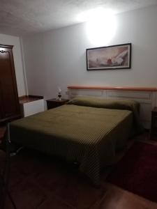 Postel nebo postele na pokoji v ubytování Casa Mari Carmen y Jose