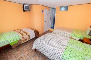 Letto o letti in una camera di Hostal Rossy