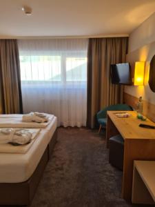 Voodi või voodid majutusasutuse Hotel Zirbenhof toas