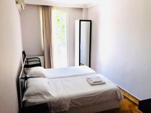 Postel nebo postele na pokoji v ubytování Hotel Dolphin Batumi