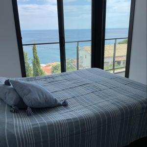A bed or beds in a room at Apartment SEA VIEW