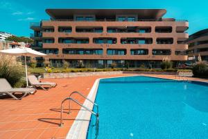 Bazén v ubytování Nobile apartment - Coral Residence complex with parking & pool nebo v jeho okolí