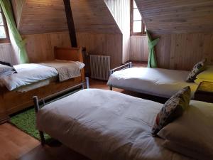 Giường trong phòng chung tại Villa Gracieuse