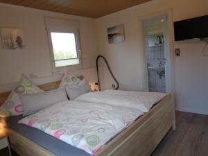Postel nebo postele na pokoji v ubytování Ferienwohnung Simmering