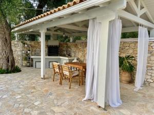 Patio alebo iná vonkajšia časť ubytovania White Orchard