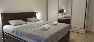 Posteľ alebo postele v izbe v ubytovaní Apartman R&R,3 room apartman in the center Šibenik