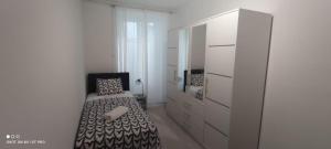Posteľ alebo postele v izbe v ubytovaní Apartman R&R,3 room apartman in the center Šibenik