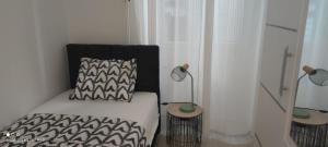 Posteľ alebo postele v izbe v ubytovaní Apartman R&R,3 room apartman in the center Šibenik