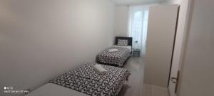 Posteľ alebo postele v izbe v ubytovaní Apartman R&R,3 room apartman in the center Šibenik