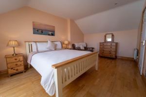 Uma cama ou camas num quarto em Burnham View