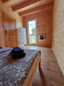 Katil atau katil-katil dalam bilik di Domki Sielankowo