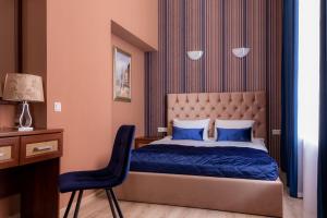 מיטה או מיטות בחדר ב-Dom Knyazya