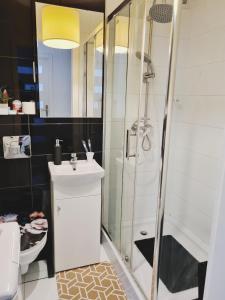 Kúpeľňa v ubytovaní Apartament Centrum Jana Pawła II