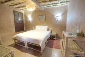Guest House Bagdad Café客房内的一张或多张床位