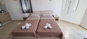 Postel nebo postele na pokoji v ubytování Soula appartments