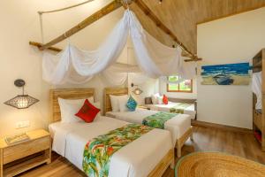 Cama ou camas em um quarto em Pax Ana Doc Let Resort & Spa
