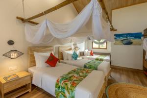 Cama ou camas em um quarto em Pax Ana Doc Let Resort & Spa