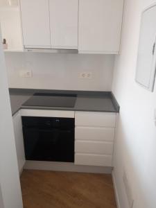Kuchyň nebo kuchyňský kout v ubytování HH Apartamento Algarrobo costa