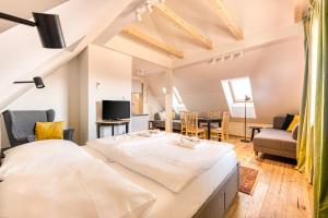 TV a/nebo společenská místnost v ubytování Apartmány Filipovice