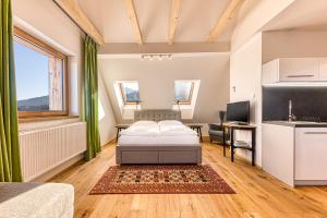 Postel nebo postele na pokoji v ubytování Apartmány Filipovice