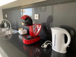 Coffee and tea making facilities at Apartment SEA VIEW