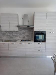 Η κουζίνα ή μικρή κουζίνα στο Casa Alice +3 φωτογραφίες