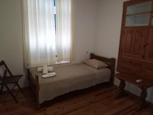 A bed or beds in a room at Lemon House