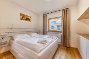Postel nebo postele na pokoji v ubytování Apartmány Filipovice