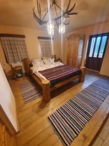 Postel nebo postele na pokoji v ubytování Casa tradițională Bilbor