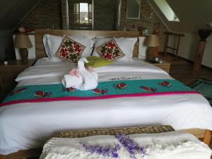 Postel nebo postele na pokoji v ubytování Ocean Bird & Wanita's Self Catering