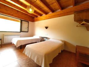Säng eller sängar i ett rum på Casa Rural el Rincón