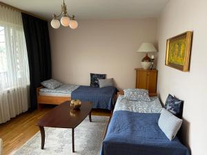 Katil atau katil-katil dalam bilik di Apartament Siewna-moje miejsce na idealne wakacje