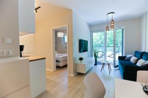 Χώρος καθιστικού στο M&K Apartament Nadmorski Zagajnik - Sobieszewo, Wyspa Sobieszewska