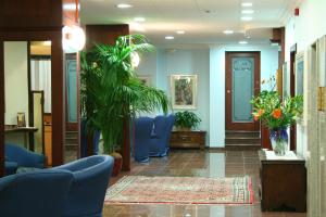 Lobbyen eller receptionen på Hotel President