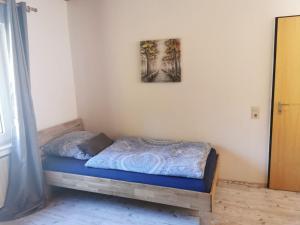 Postel nebo postele na pokoji v ubytování Ruridylle 1