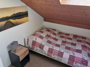 Postel nebo postele na pokoji v ubytování Ruridylle 1