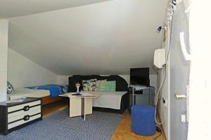 TV a/nebo společenská místnost v ubytování Apartmani Kate