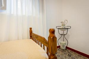 A bed or beds in a room at La Vaquería