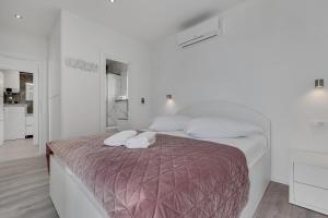 Postel nebo postele na pokoji v ubytování Villa Pejic NEW, PENTHOUSE