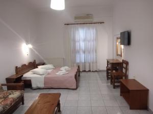 Postel nebo postele na pokoji v ubytování Apollonio Nikopolis