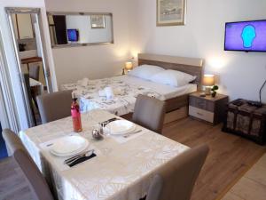 Postel nebo postele na pokoji v ubytování M&K studio apartment