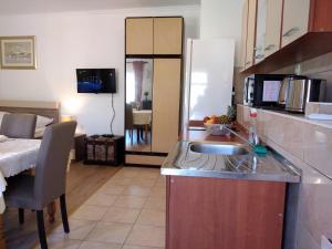 Kuchyň nebo kuchyňský kout v ubytování M&K studio apartment