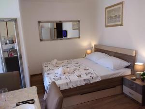 Postel nebo postele na pokoji v ubytování M&K studio apartment
