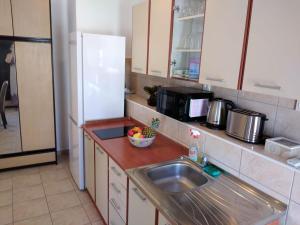 Kuchyň nebo kuchyňský kout v ubytování M&K studio apartment