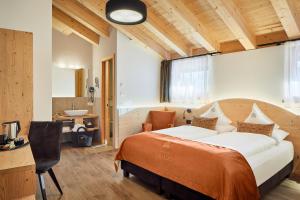Voodi või voodid majutusasutuse Hotel Tabladel toas