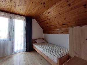 Postel nebo postele na pokoji v ubytování Vikendica Vera