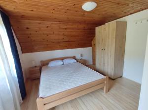 Postel nebo postele na pokoji v ubytování Vikendica Vera