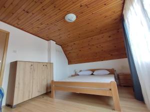 Postel nebo postele na pokoji v ubytování Vikendica Vera